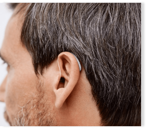 Close up of a man's ear wearing Signia hearing aids